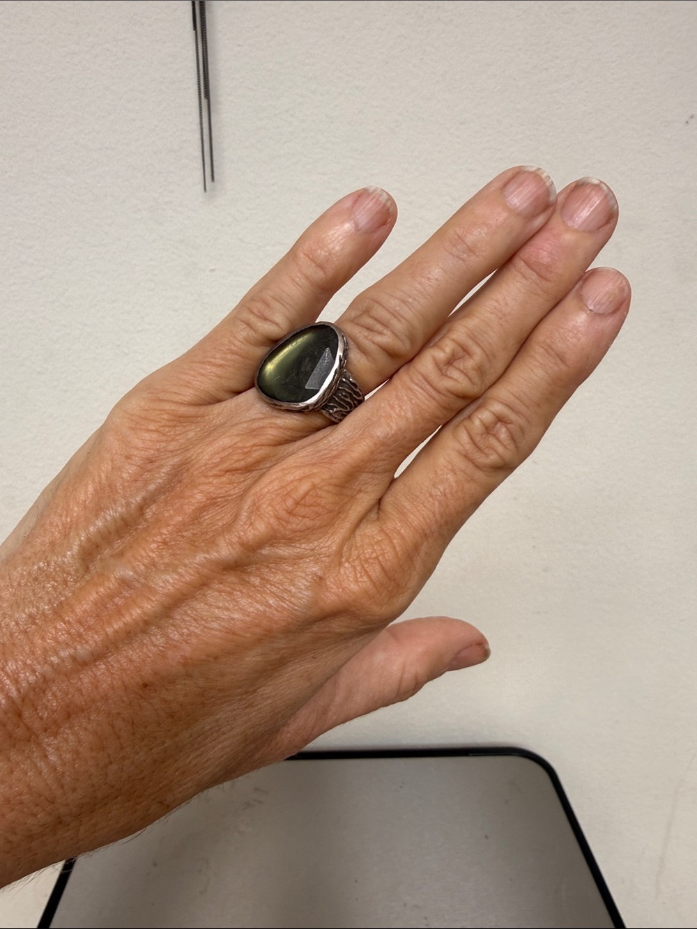 Sterling silver Silpada ring with a green stone